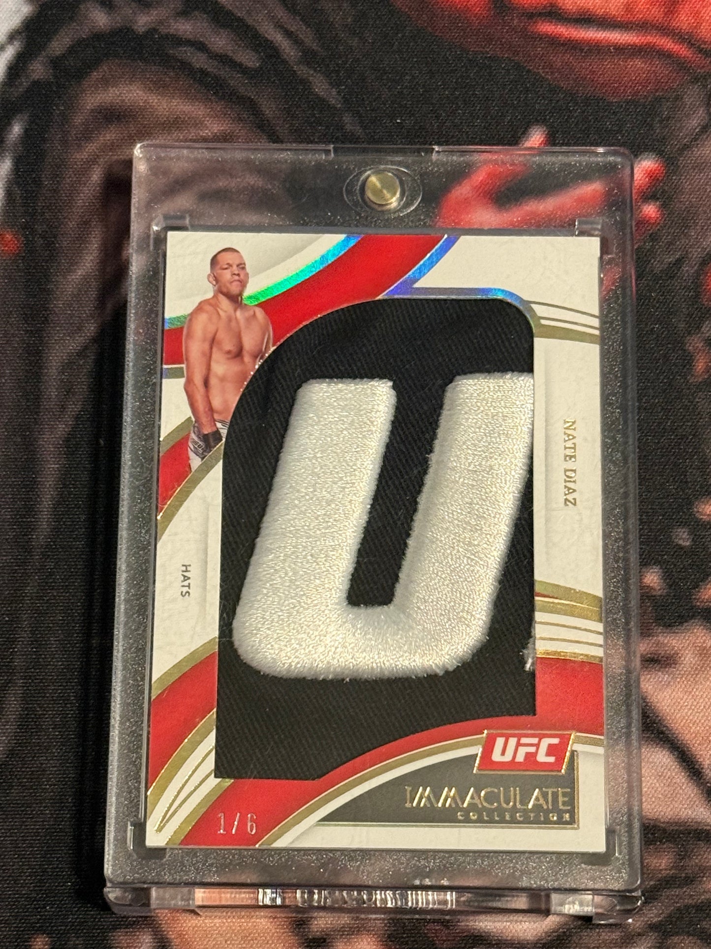 UFC - 2022 Panini Immaculate Collection - Nate Diaz - SERIALIZED HATS RELIC BOOKEND 1/6 - #JM-209 - M/NM+