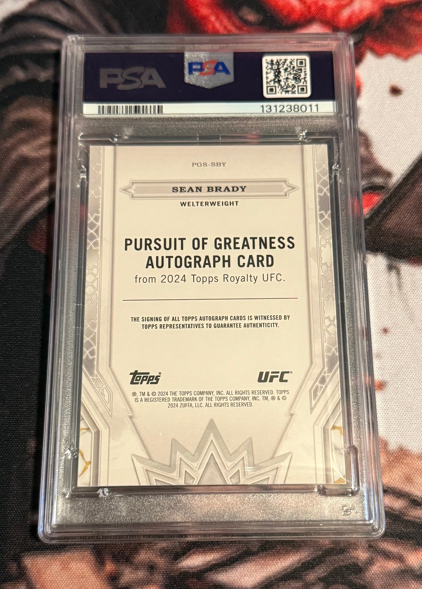 UFC - 2024 Topps Royalty - Sean Brady Pursuit of Greatness - SERIALIZED AUTO /25 - #PGS-SBYP - PSA 7
